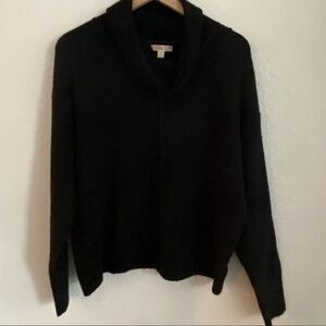 Black cowel neck sweater.